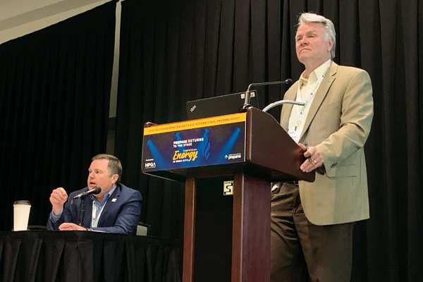 Randy Doyle, right, and PERC’s Bryan Cordill discuss manufactured housing at the 2022 Propane Expo. (Photo by LP Gas staff)