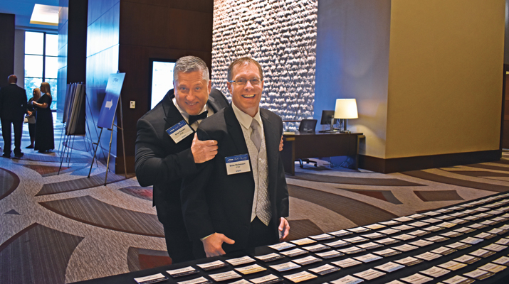 LP Gas’ Brian Kanaba, left, and Brian Richesson share a lighthearted moment before the event. (Photo by LP Gas staff)