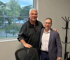 Bob Burger (left) and Joe Armentano celebrate Paraco Gas' acquisition of North Shore Bottled Gas. (Photo courtesy of Paraco Gas)