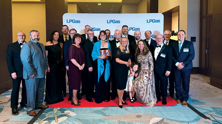 Inductee Denis Gagne, center, celebrates his Hall of Fame induction with strong support from his friends and family. (Photo by LP Gas Staff)