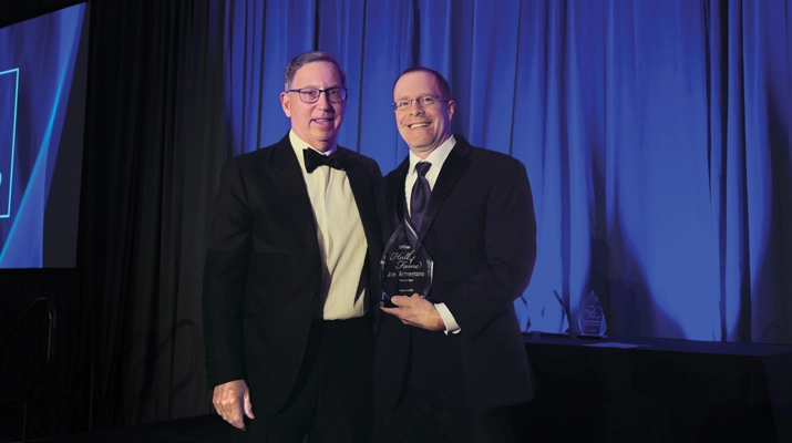 LP Gas Editor-in-Chief Brian Richesson, right, presents Joe Armentano of Paraco Gas with his award. (Photo by LP Gas Staff)